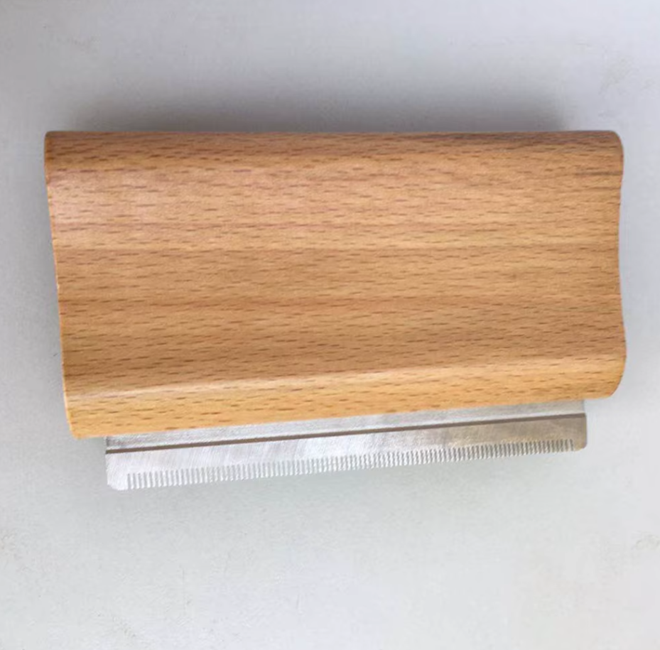 Wooden block and stainless teeth